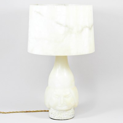 Lot 416 - A white alabaster lamp and shade, carved with...