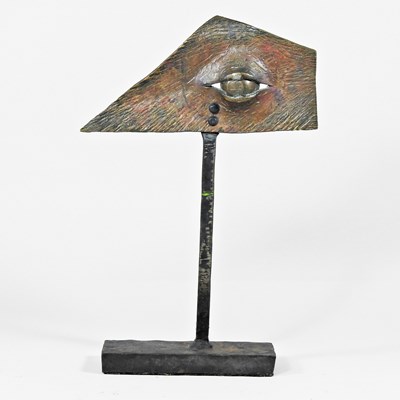 Lot 280 - A bronze sculpture of a horse's eye, on a...