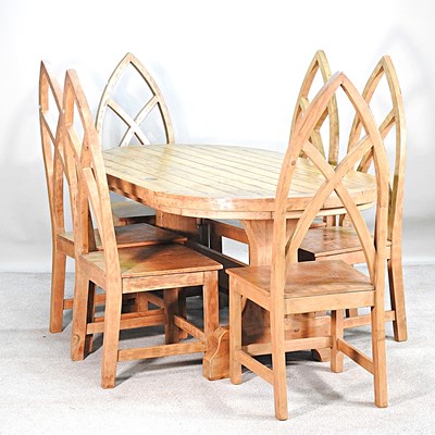 Lot 411 - A pine gothic style dining table, 180cm wide,...
