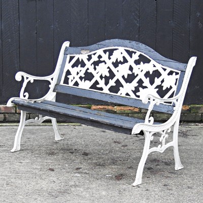 Lot 384 - A metal and wooden garden bench