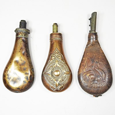 Lot 39 - A 19th century copper powder flask, together...