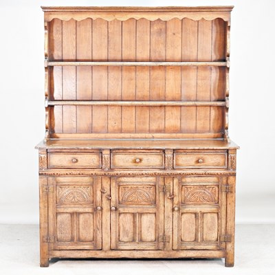 Lot 183 - A carved oak dresser, by Titchmarsh & Goodwin,...