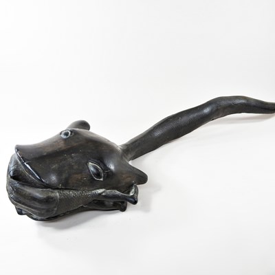 Lot 369 - An African carved hardwood sculpture of a...