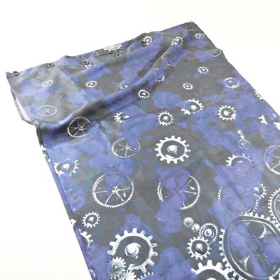 Lot 614 - A shift dress, decorated with cogs, by...