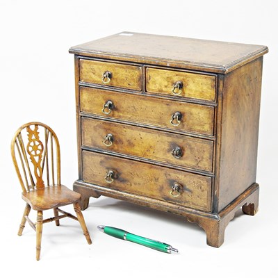 Lot 15 - An early 20th century walnut and featherbanded...