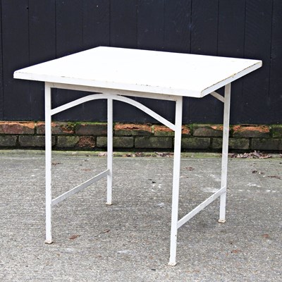 Lot 539 - A white painted iron garden table