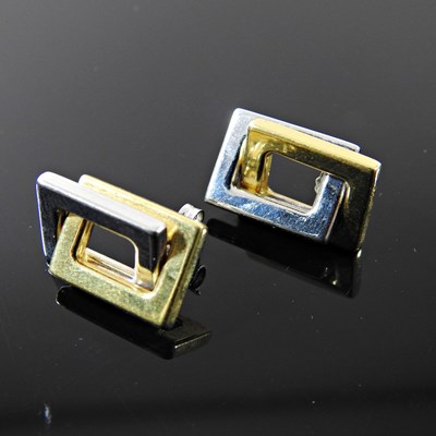 Lot 12 - A pair of 18 carat two colour gold earrings,...