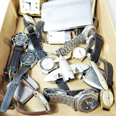 Lot 619 - A collection of wristwatches, lighters,...