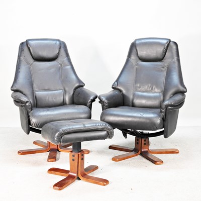 Lot 252 - A pair of reclining swivel armchairs, together...