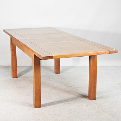 Lot 608 - A modern oak pull-out extending dining table,...