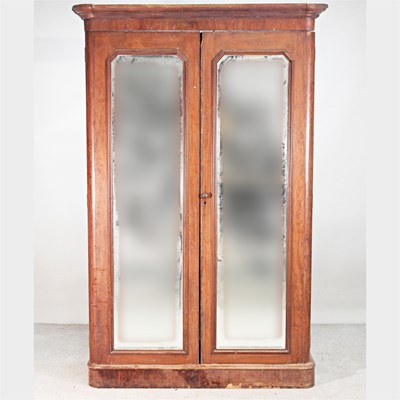 Lot 452 - A Victorian mahogany double wardrobe, enclosed...