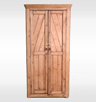 Lot 117 - An antique pine standing corner cupboard,...