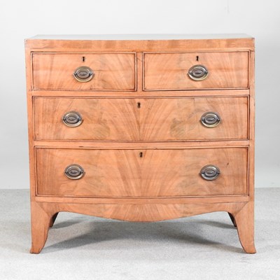 Lot 433 - A small Regency style bow front chest of...