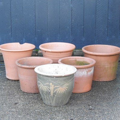Lot 309 - A collection of five terracotta garden pots,...