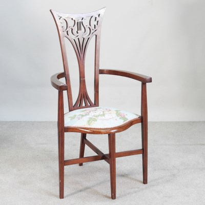 Lot 429 - An Edwardian high back elbow chair, with an...