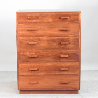 Lot 335 - A 1930s chest, containing a row of six drawers