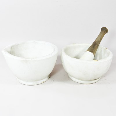Lot 224 - A marble mortar, 22cm wide, together with...