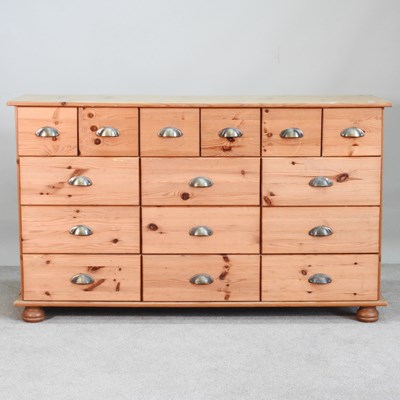Lot 80 - A pine merchant's chest, containing an...