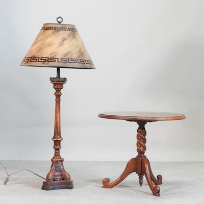 Lot 444 - An Italian style carved wooden table lamp and...