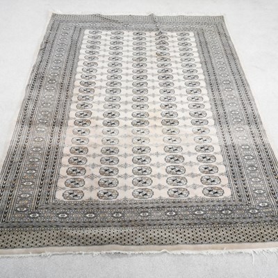 Lot 246 - A Bokhara rug, with rows of medallions, on a...