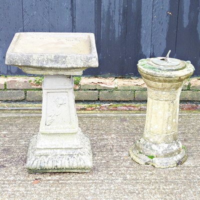 Lot 486 - A cast stone bird bath, 63cm high, together...