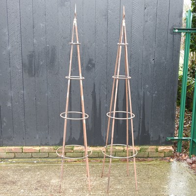 Lot 582 - A pair of metal garden obelisk plant supports,...