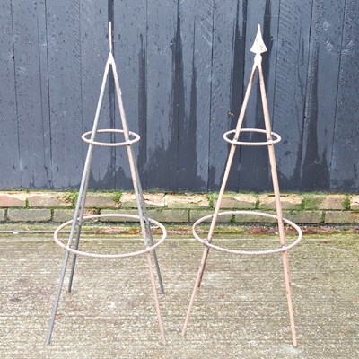 Lot 557 - A pair of metal garden obelisk plant supports,...
