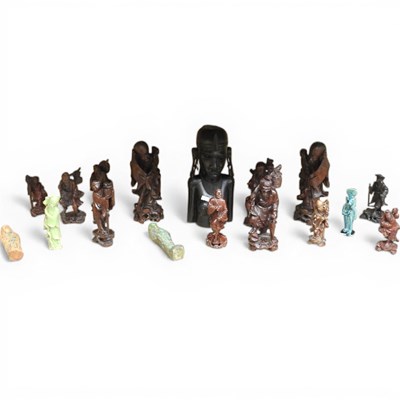 Lot 351 - A collection of Chinese carved hardwood...