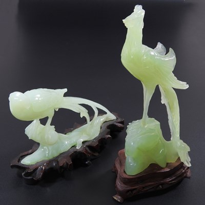 Lot 618 - A Chinese carved hardstone model of a bird,...
