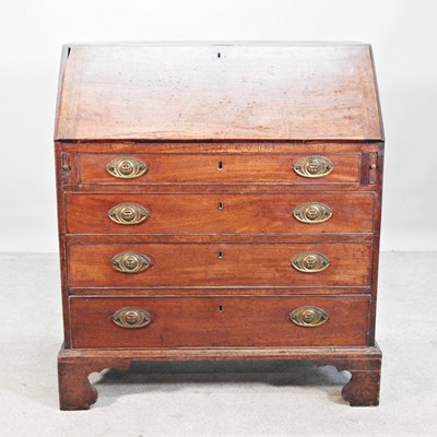 Lot 643 - A George III mahogany bureau, on bracket
