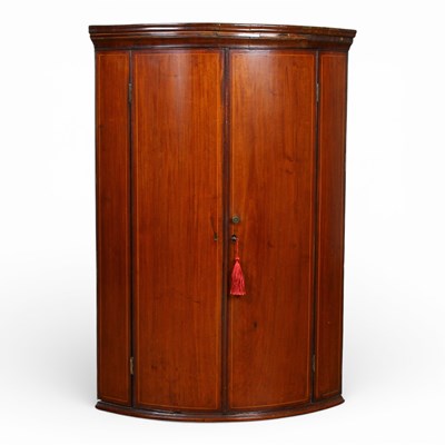 Lot 409 - A George III mahogany bow front wall mounted...