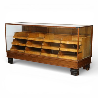 Lot 139 - An early 20th century light oak...