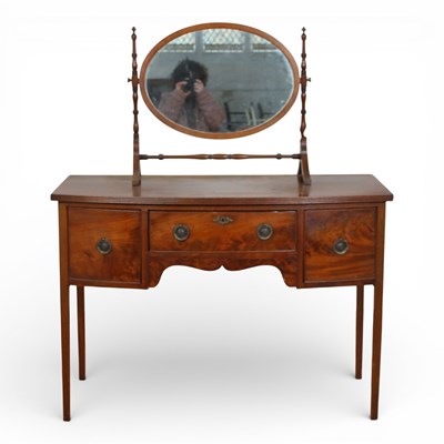 Lot 670 - A mahogany bow front sideboard, together with...