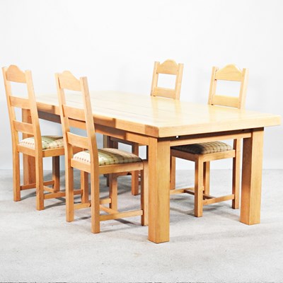 Lot 219 - An oak dining table, 220cm wide, together with...