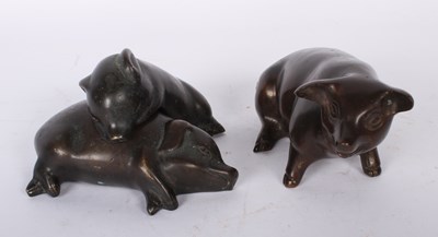 Lot 221 - A collection of three bronze models of pigs