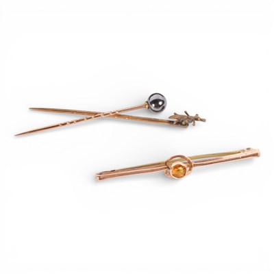 Lot 36 - A 9 carat yellow gold stick pin, together with...