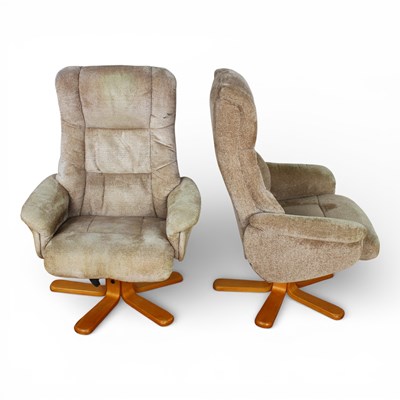 Lot 640 - A pair of swivel recliner chairs in beige, 77...