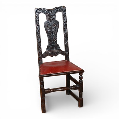 Lot 450 - An antique carved oak single dining chair