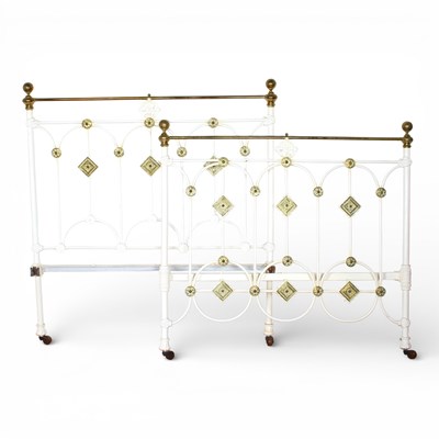 Lot 487 - A Victorian brass and white painted bed frame