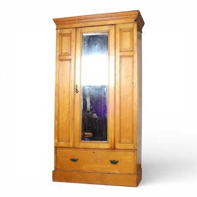 Lot 414 - An early 20th century oak single wardrobe,...