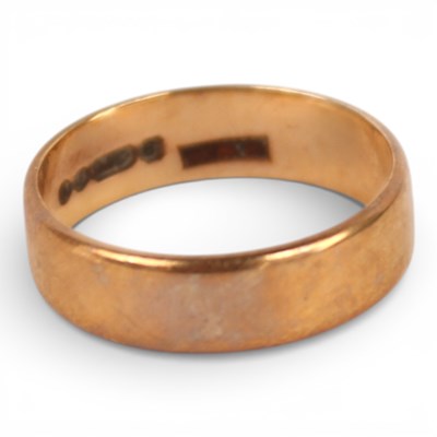 Lot 30 - A 9 carat yellow gold wedding band, 2.4g