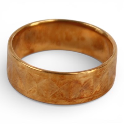 Lot 13 - An 18 carat yellow gold wedding band, 3.8g
