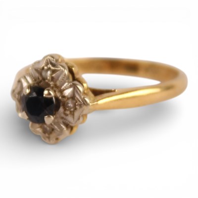 Lot 16 - An 18 carat yellow gold sapphire and diamond...