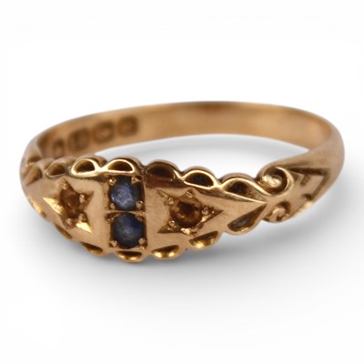 Lot 19 - An 18 carat yellow gold sapphire two stone...