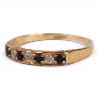 Lot 43 - A 9 carat yellow gold sapphire and diamond...