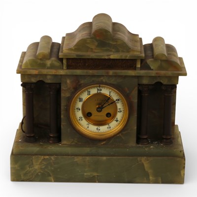 Lot 168 - A late 19th century onyx cased mantel clock,...
