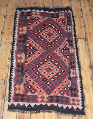 Lot 414 - A kelim rug, with geometric decoration, 190 x...