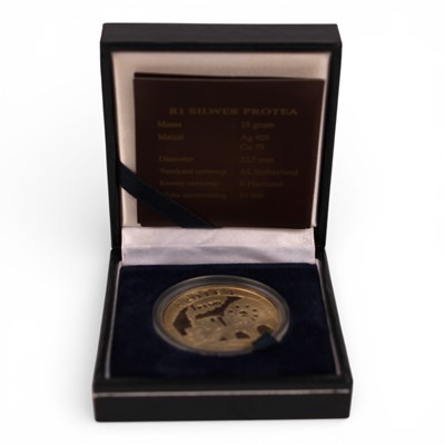 Lot 96 - A 1995 South African silver Protea one Rand...