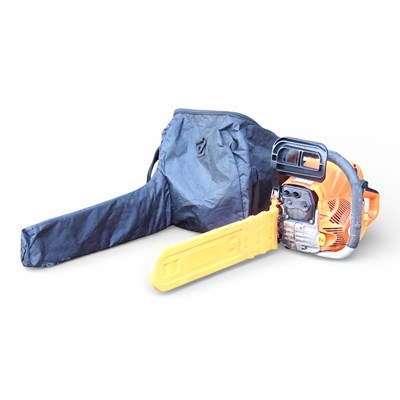 Lot 615 - A petrol chainsaw, with cover