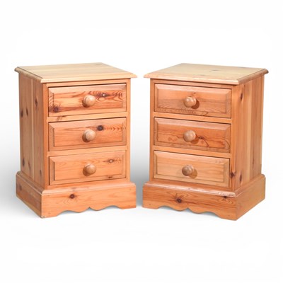 Lot 256 - A pair of modern pine bedside chests, each...